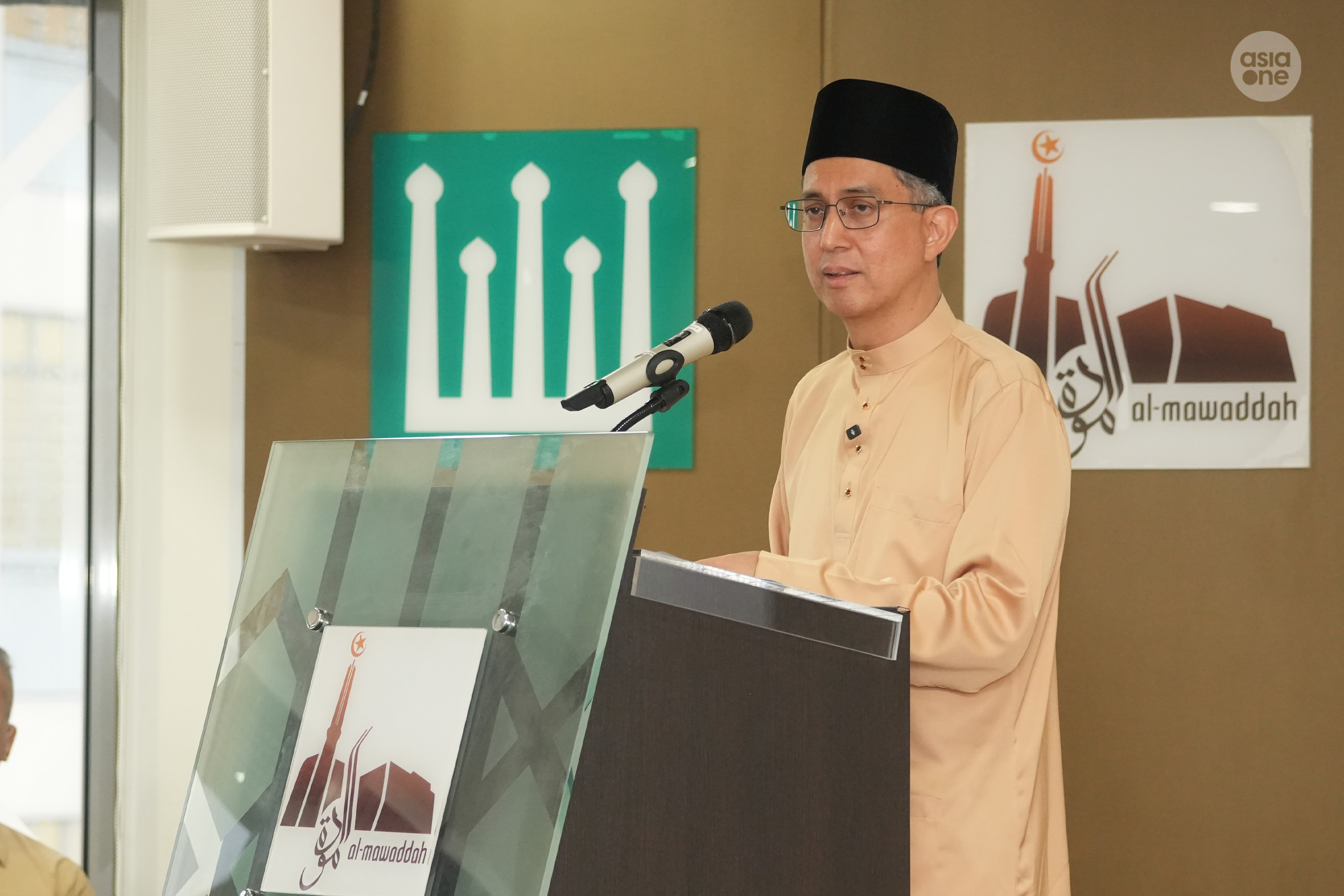 Acting Minister-in-charge of Muslim Affairs Assoc Prof Faishal Ibrahim speaking at the break fast event with President Tharman Shanmugaratnam on Friday (Feb 20). 