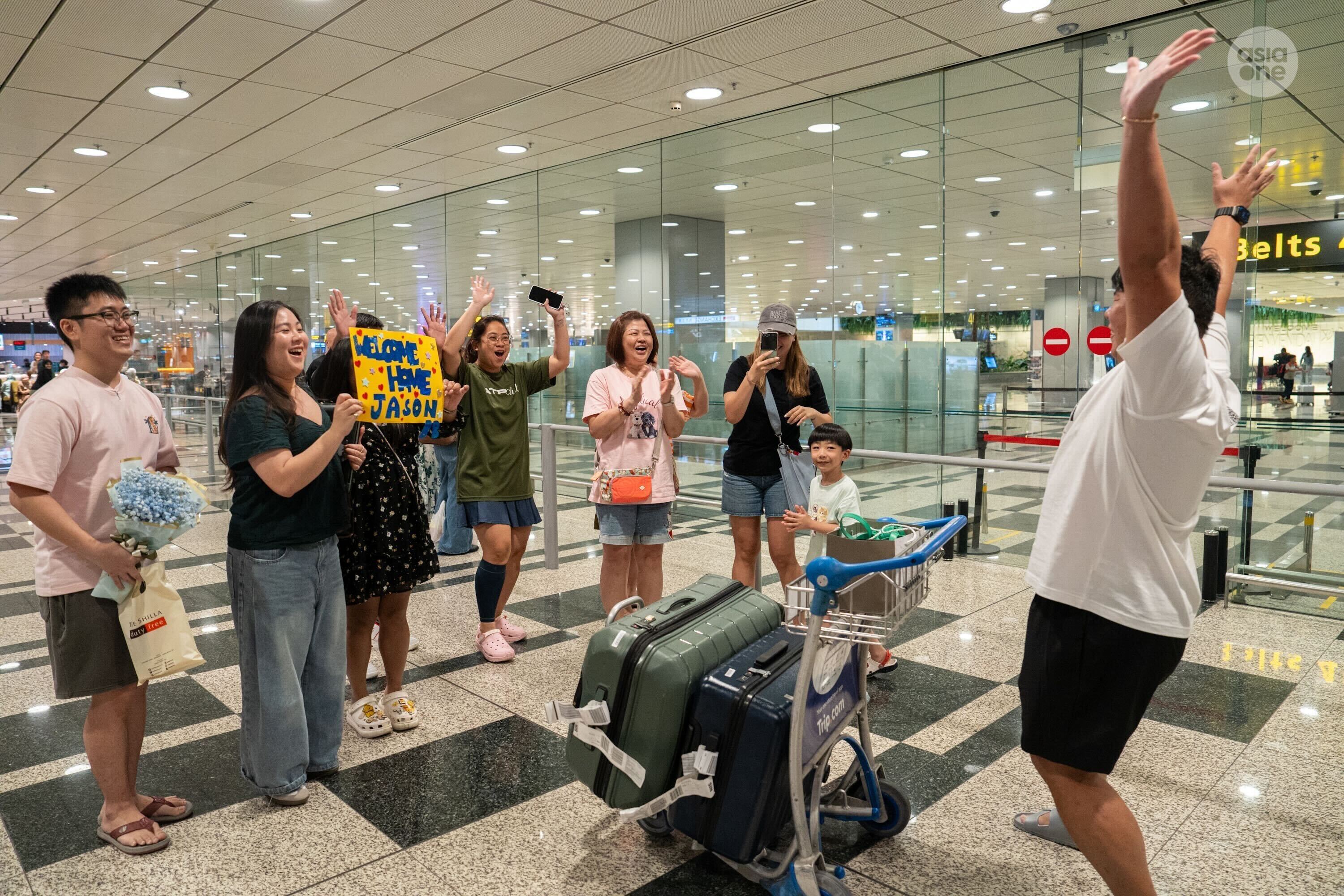 Jason Low was received at Changi Airport Terminal by his family.