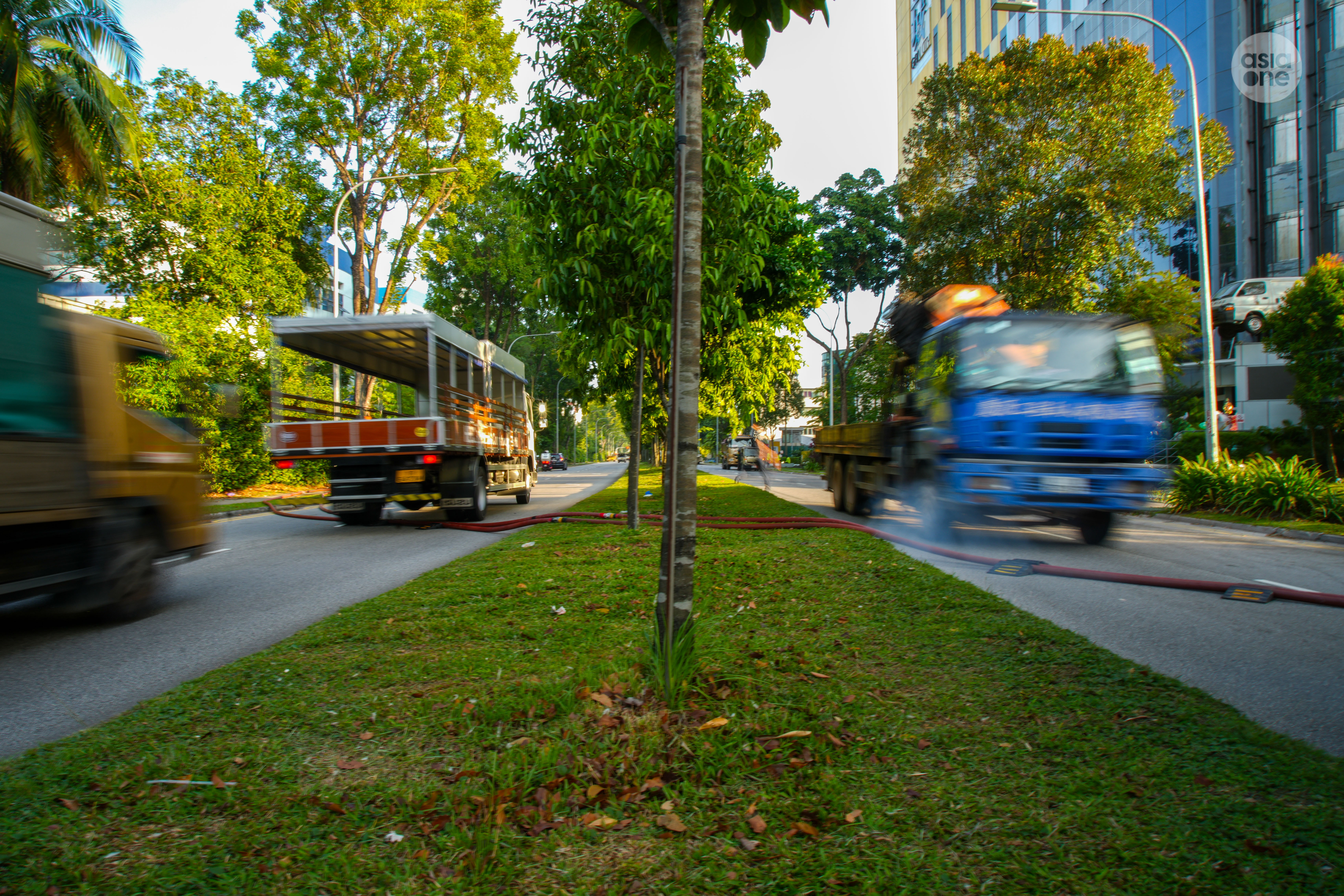 Police officers were on scene for traffic control duties as fire hoses were run across Sungei Kadut Drive.