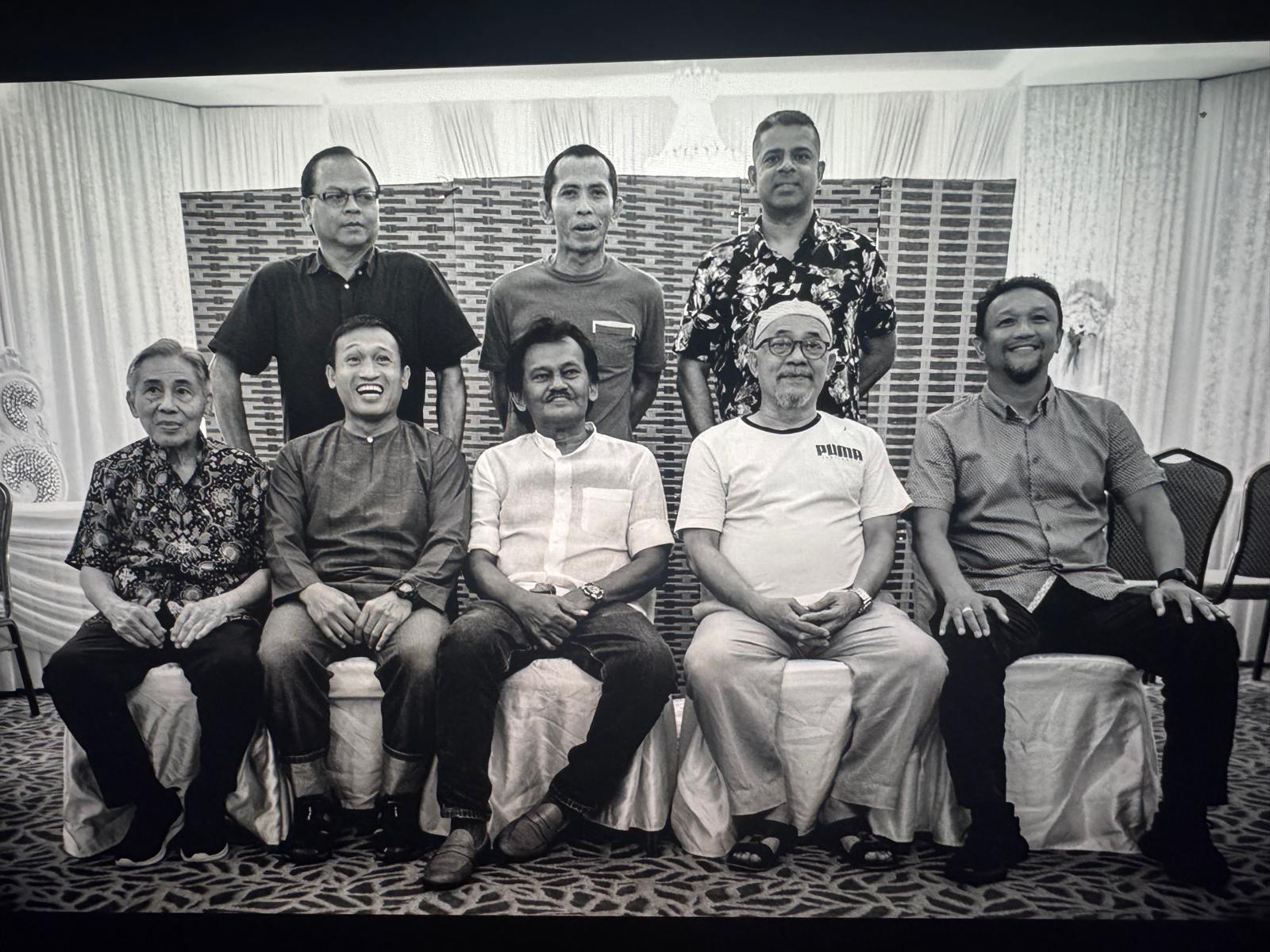 Fandi Ahmad and Tokijan (back row, far left) with former players and coaches of Geylang United at a gathering.