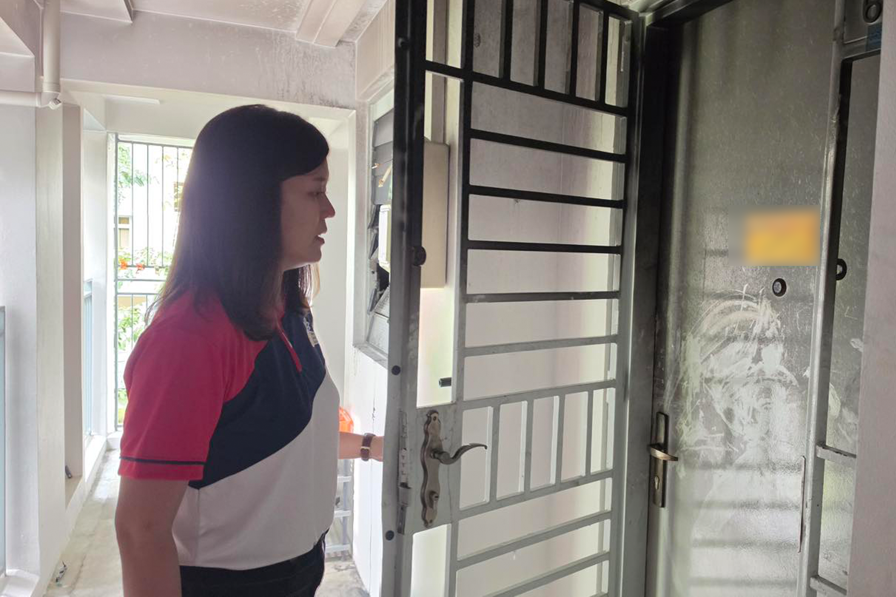 A picture posted by Nee Soon GRC MP Lee Hui Ying shows the unit's broken window, which is believed to have been used by two residents to access the unit to rescue their neighbour.